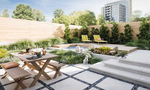 Modern backyard by Cordes Family Landscaping and Snow LLC features a wooden picnic table, benches, small pool, lounge chairs, greenery, and decorative statues. Steps lead to the seating area with tall buildings and trees in the background. Modern backyard by Cordes Family Landscaping and Snow LLC features a wooden picnic table, benches, small pool, lounge chairs, greenery, and decorative statues. Steps lead to the seating area with tall buildings and trees in the background.