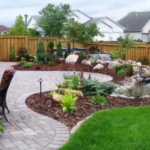 A landscaped backyard - Cordes Family Landscape & Snow LLC